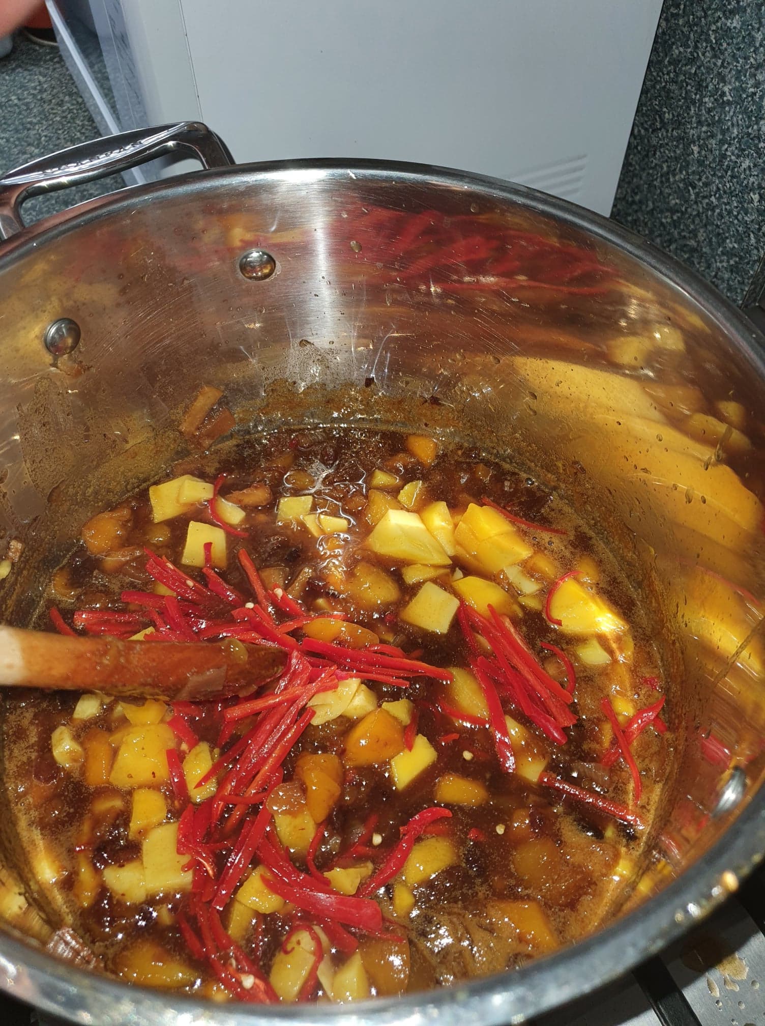 Cooking chutney in pot